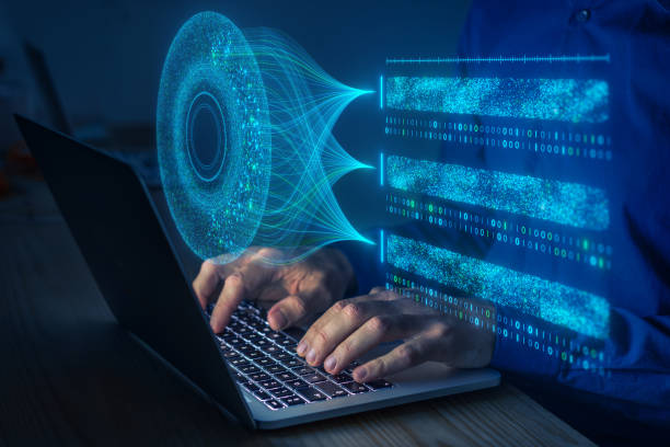 istockphoto-2012393906-612×612 Big data analysis with AI technology. Person using machine learning and deep learning neural network for data science, data mining, business analytics, automation, data engineering. Glowing particles.